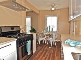 Freeland_Unit1KitchenDiningRm_SouthLowView_DSCF1841.JPG